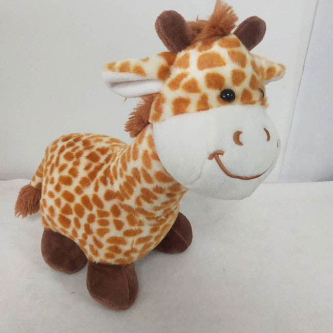 Standing light brown giraffe